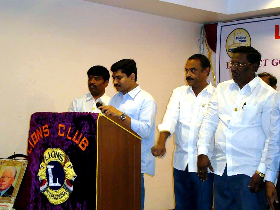 Ravi Thota speaking at a Lions Club event